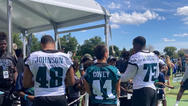 Post-practice autograph line with Patrick Johnson, Britain Covey, and Tarron Jackson